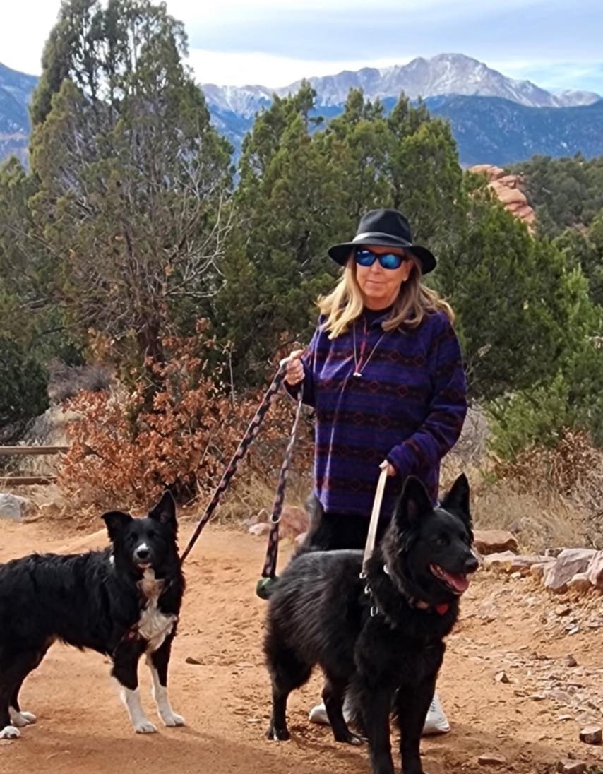 Judy enjoying life outdoors with her dogs
